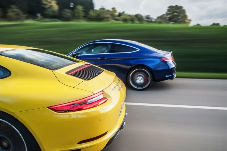 Mercedes AMG C63 vs Porsche 911 Carrera S : Duel en 2026 ? - Mercedes AMG C63